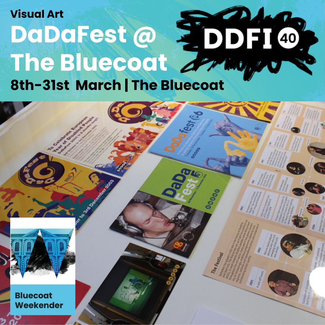 A table top is covered in past leaflets and programmes from DaDaFest Events gone by